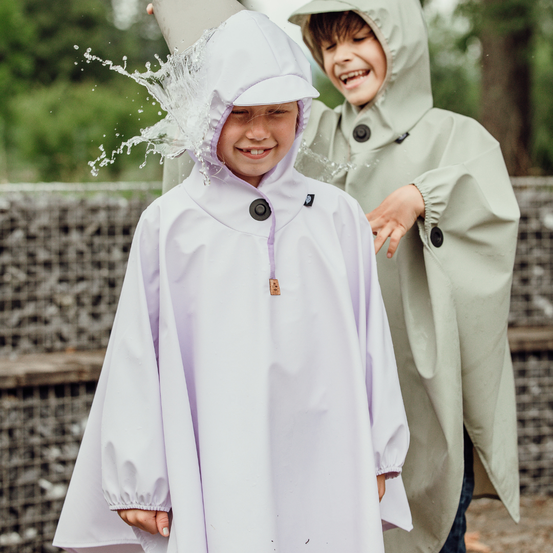 Regenheld Poncho mit Magnetknöpfen "Flieder"
